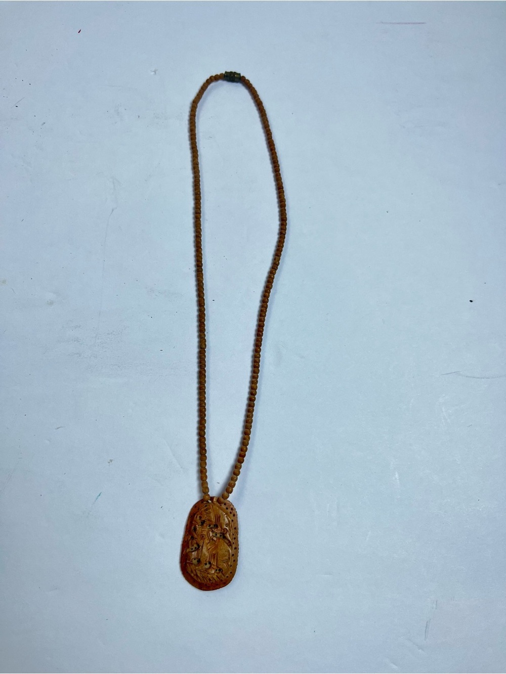 Hand-Carved Wooden Pendant Necklace from India $20
